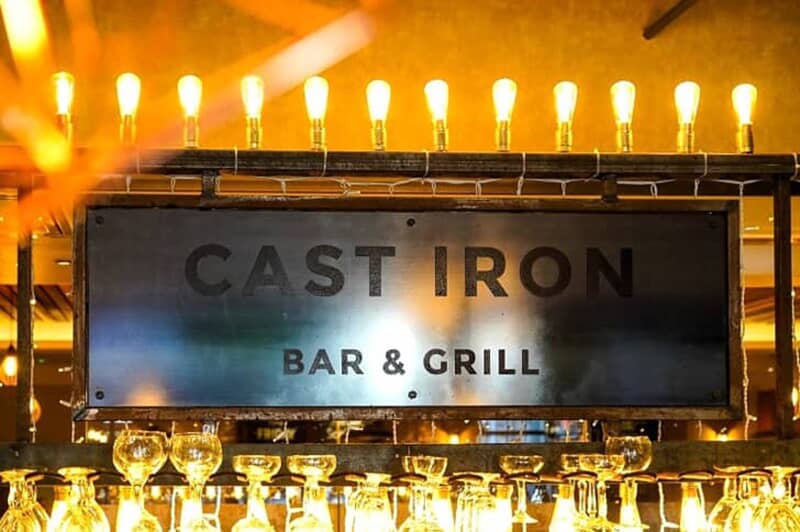 An image of the Cast Iron Bar & Grill interior signage.